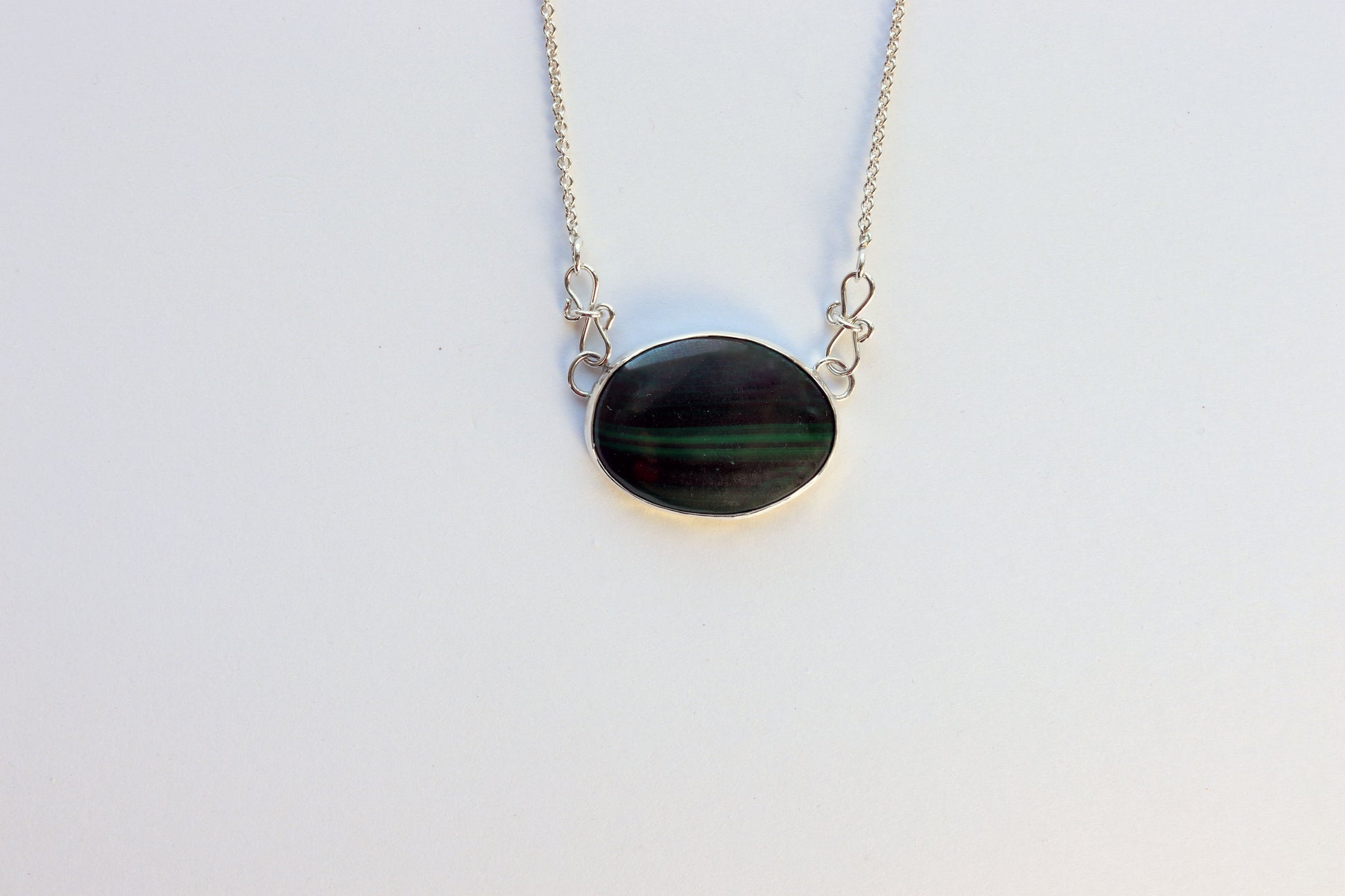 Malachite necklace, handcrafted in a timeless lavaliere style.