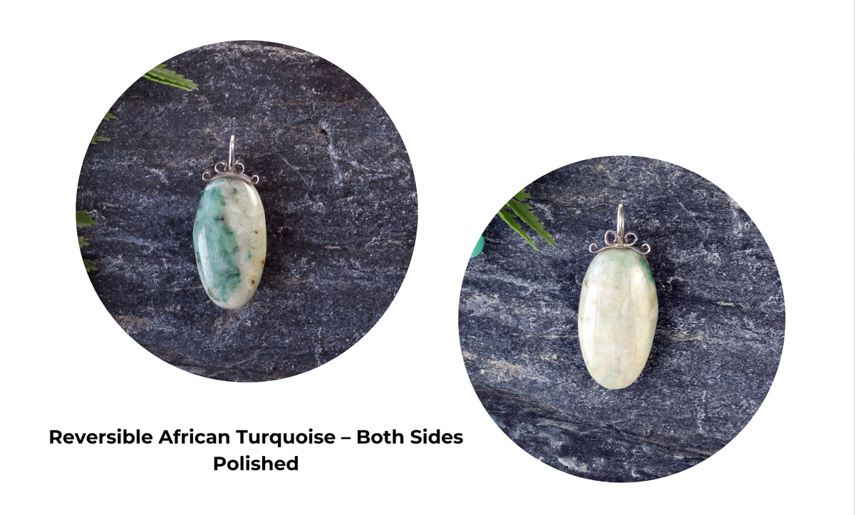 Handcrafted African Turquoise pendant with Argentium 935 Silver bail, 57.15mm, showing side by side both reversible polished sides with blue-green hues and matrix patterns on a gray stone background.
