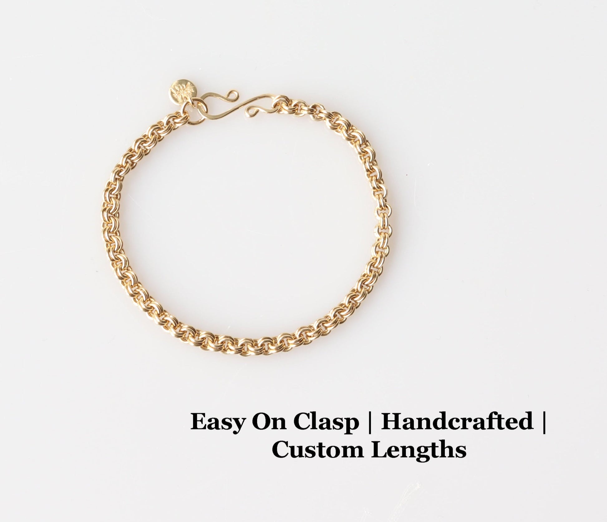 A brass chainmaille bracelet with custom vintage style shook clasp in custom lengths.