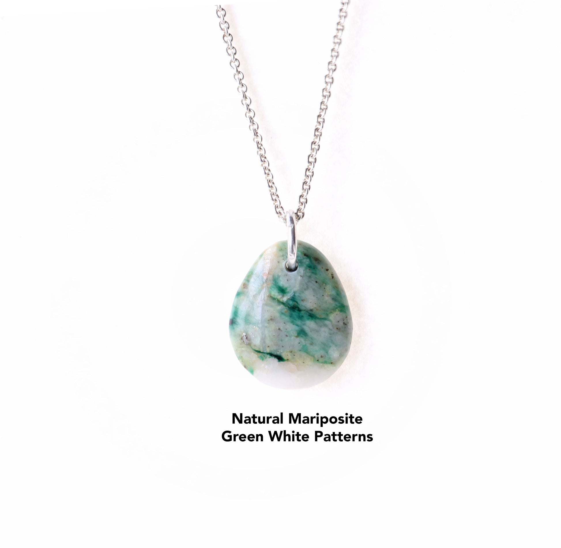 This teardrop-shaped Mariposite gemstone pendant charm showcases a vivid blend of green and white patterns, handcut and polished in our Missouri studio. An Argentium silver chain is included.