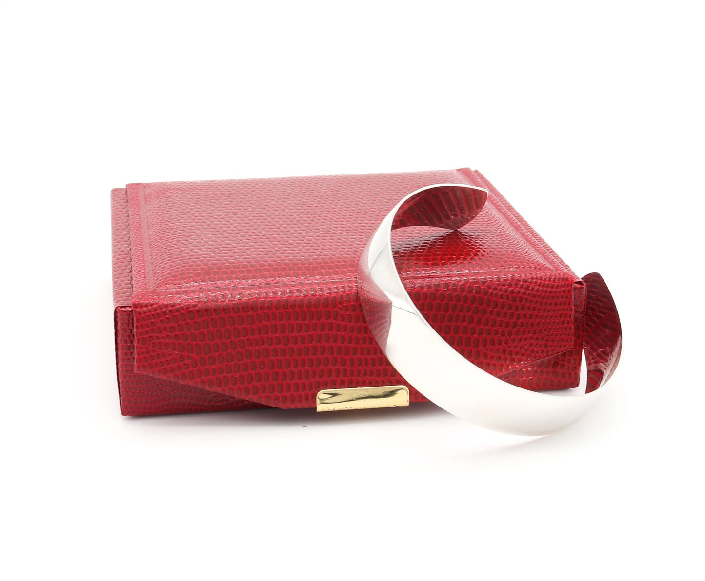 Solid Argentium Silver Cuff shown next to red gift box against white background.