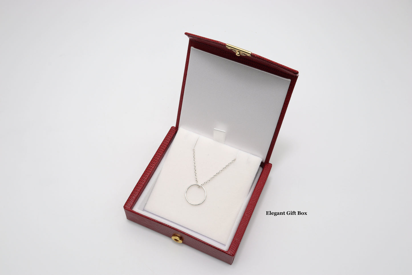 Circle Pendant Necklace comes packaged in red faux leather gift box with gold snap closure.