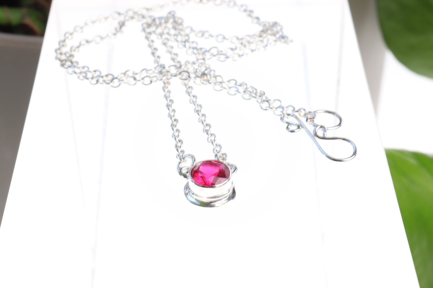 Handcrafted in our studio, a dainty and colorful lab-created 6mm Ruby. Set in solid sterling Argentium® 935 Silver, this elegant piece showcases the perfect combination of beauty and durability.