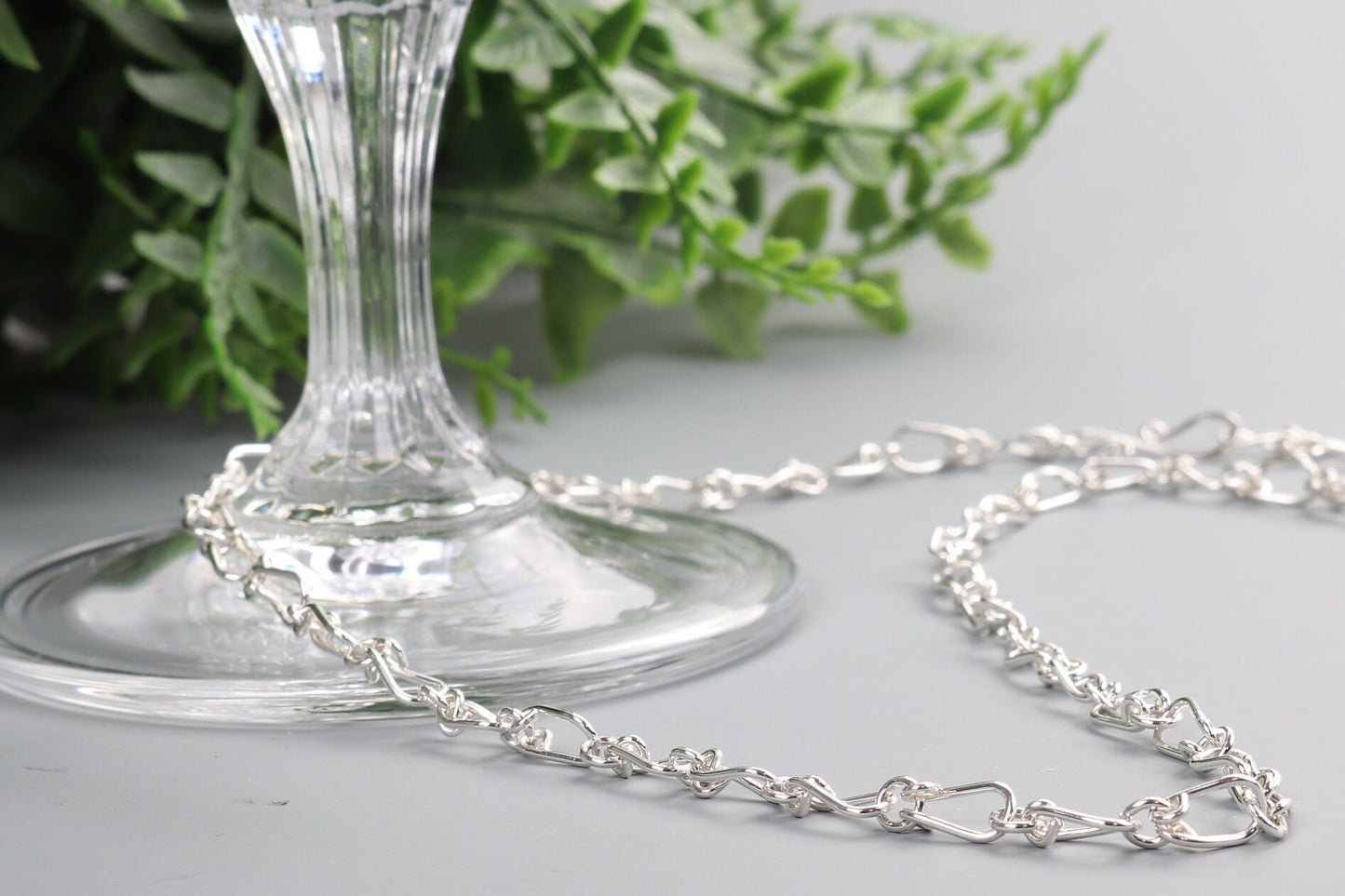 A handcrafted in our Missouri studio is our Silver Teardrop Chain Necklace in Argentium .940 a  perfect gift.  Light and delicate this unique chain features a convenient custom easy-on shepherd's hook clasp, allowing for effortless wearing and the adjustable design allows for a customized fit, with increments of .0375 inch.