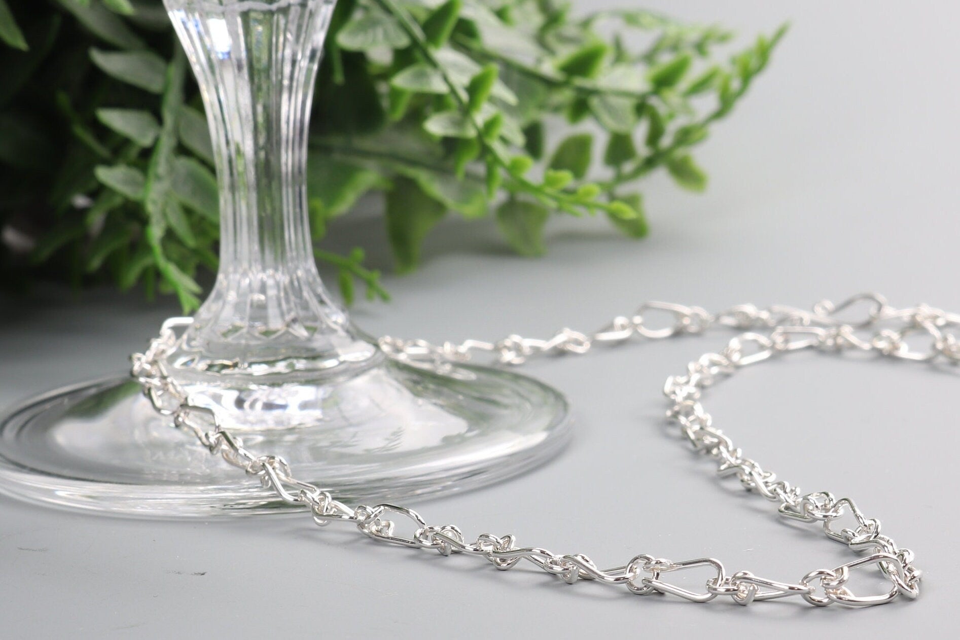 A handcrafted in our Missouri studio is our Silver Teardrop Chain Necklace in Argentium .940 a  perfect gift.  Light and delicate this unique chain features a convenient custom easy-on shepherd's hook clasp, allowing for effortless wearing and the adjustable design allows for a customized fit, with increments of .0375 inch.