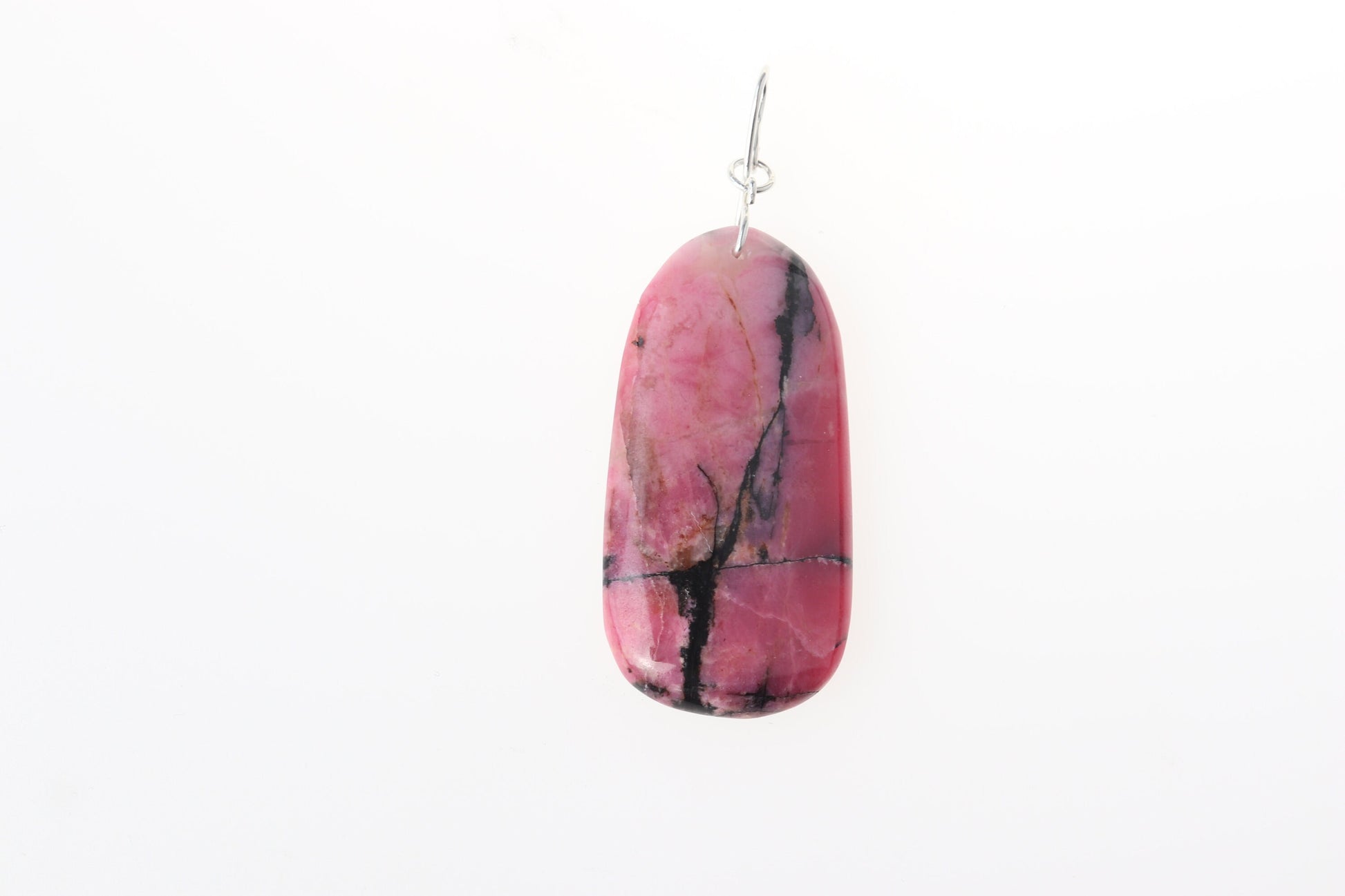 A Rhodonite pendant, featuring rich pink hues layered with dramatic black veining.