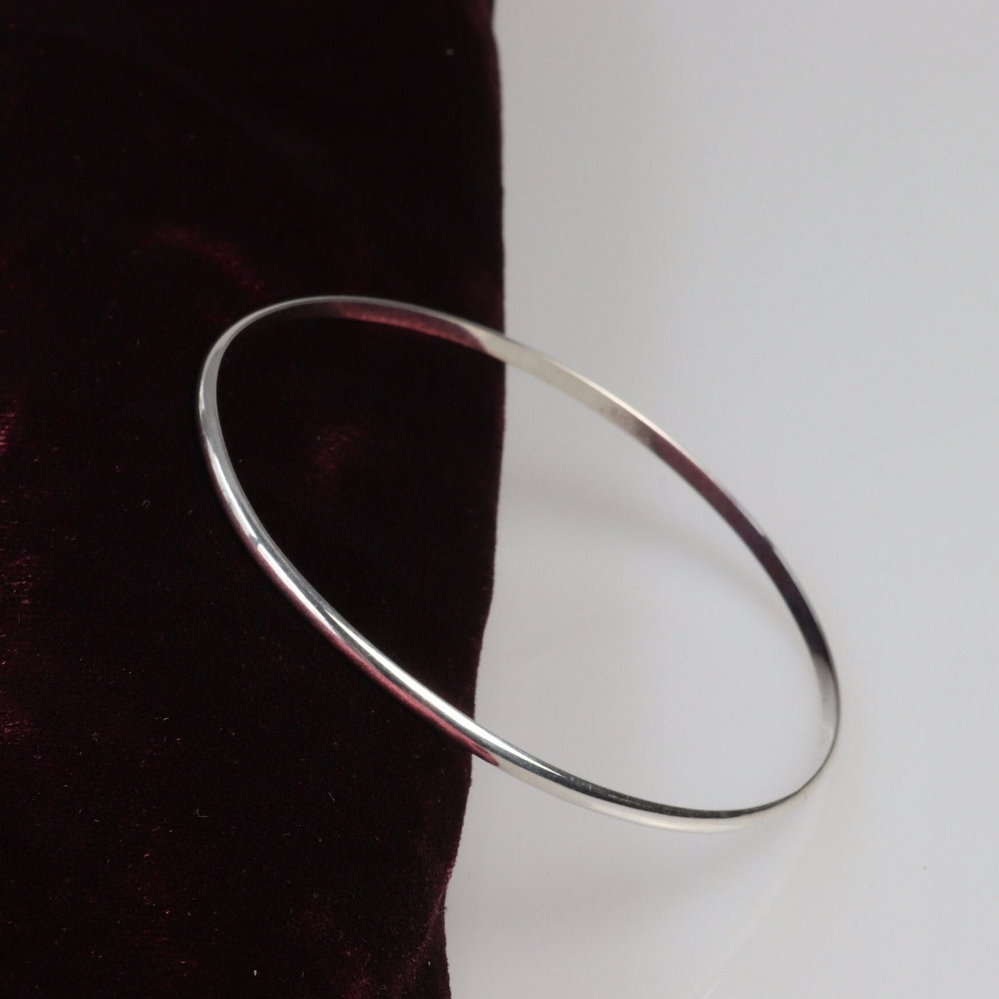 Handcrafted in our Missouri studio, this bangle features a high-polished finish, and is lightweight, comfortable and versatile. Its ideal width makes it perfect for stacking with other bracelets or wearing on its own.