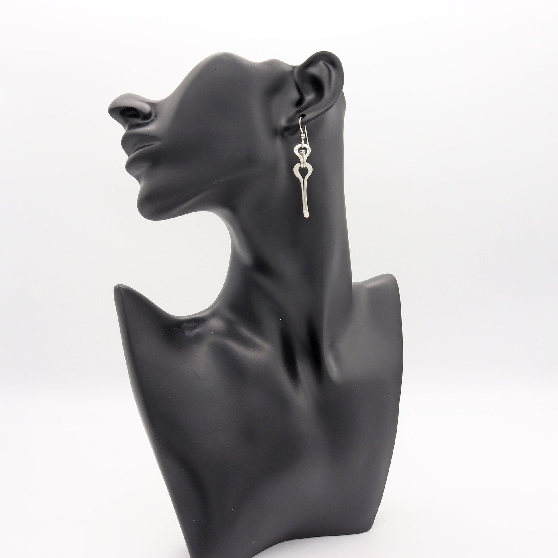Light and comfortable handcrafted solid sterling 940 Argentium® silver dangle spike shaped earrings. Crafted from sterling 940 Argentium® silver, these earrings are not only stunning but also durable, lightweight, and incredibly comfortable to wear. The Argentium® Silver ear wires, add a touch of elegance, ensure a comfortable and secure fit and are hypoallergenic with a drop length of 1.5 inches