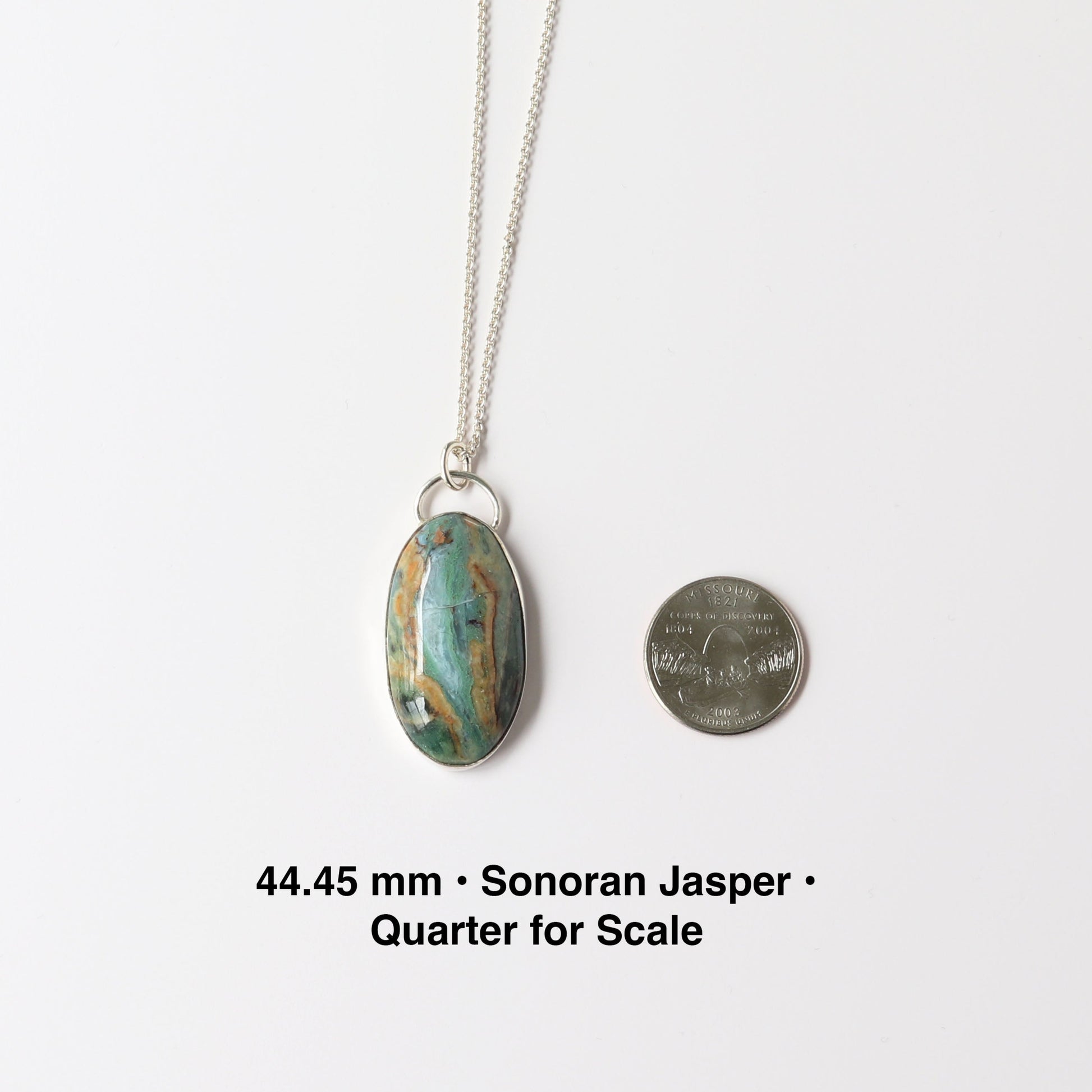 Sonoran Jasper • 935 Argentium® Silver next to quarter for size perspective or scale.