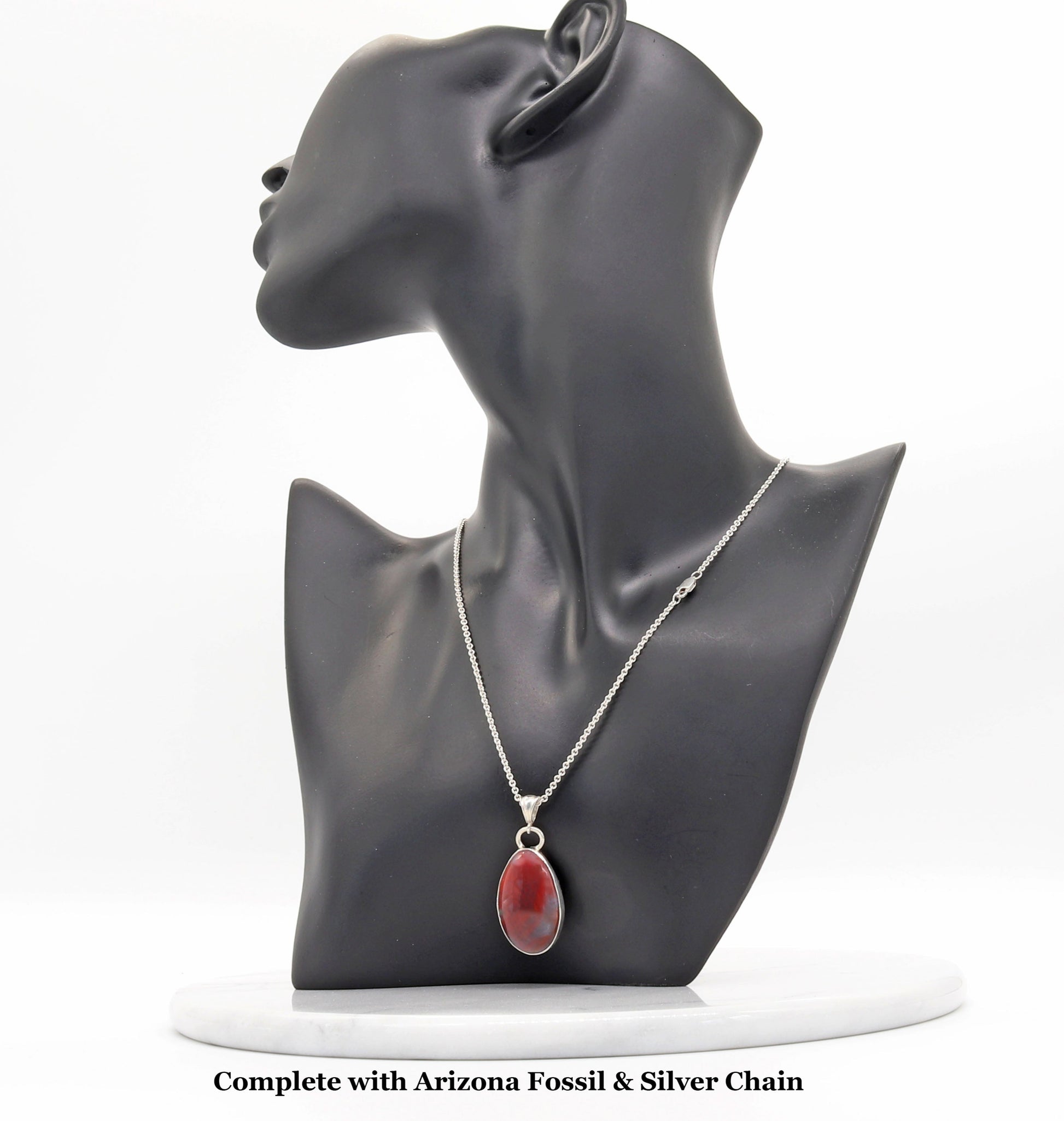 Handcrafted Petrified Rainbow Wood pendant necklace with Argentium 935 Silver bail and 18” chain, 41.48mm,   Displayed on black resin mannequin with text overlay Complete with Arizona Fossil and Silver Chain.
