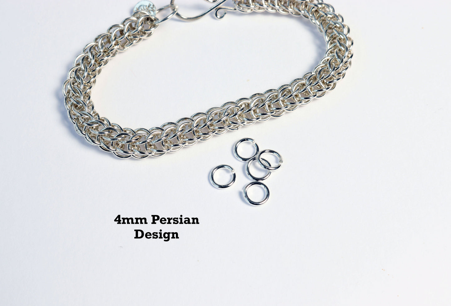 4mm Jump rings shown next persian bracelet that is crafted from these size jump rings that are made in our studio.