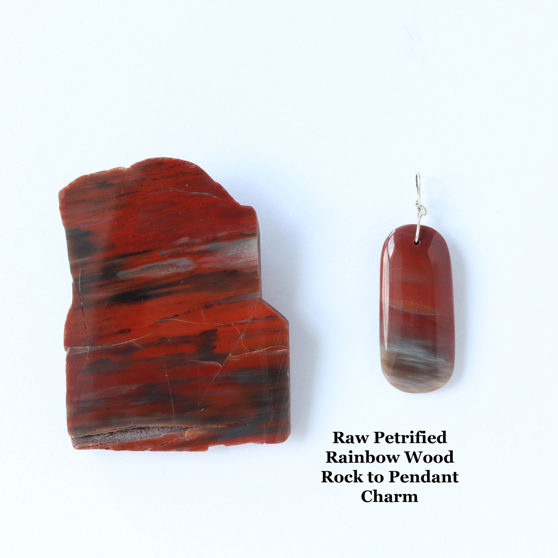 A 2.67inch Petrified Rainbow Wood pendant, shown next to actual rock used to craft this pendant charm. Sourced from Arizona’s Petrified Forest, has been meticulously hand-cut and polished on both sides to reveal its translucent colors of earthy reds grays and blacksand intricate patterns.