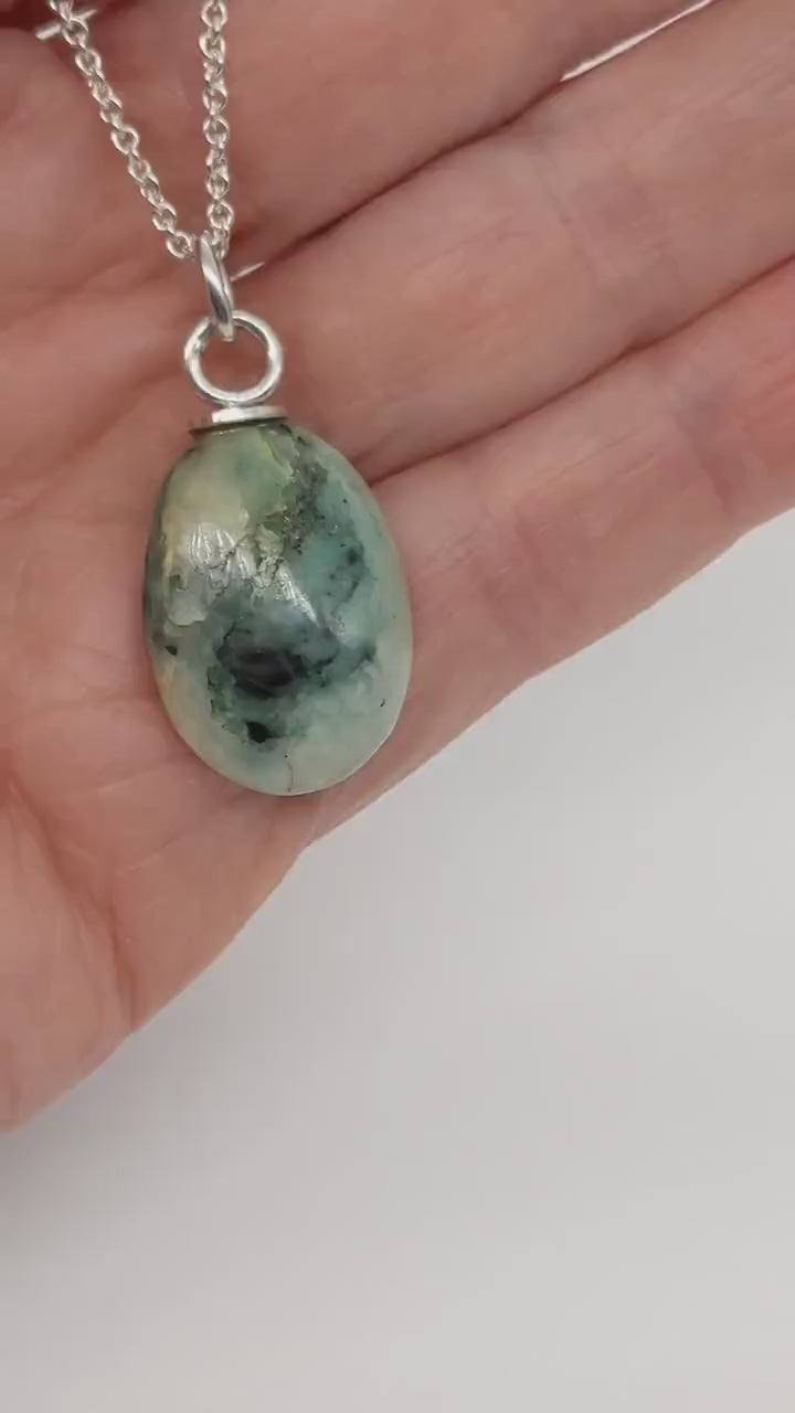 African turquoise teardrop pendant demo of design and style.