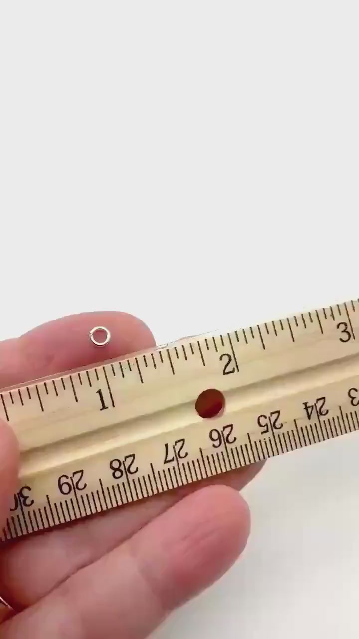 Video of 2.5 jump ring showing it next to a ruler for scale and measurement perspective.