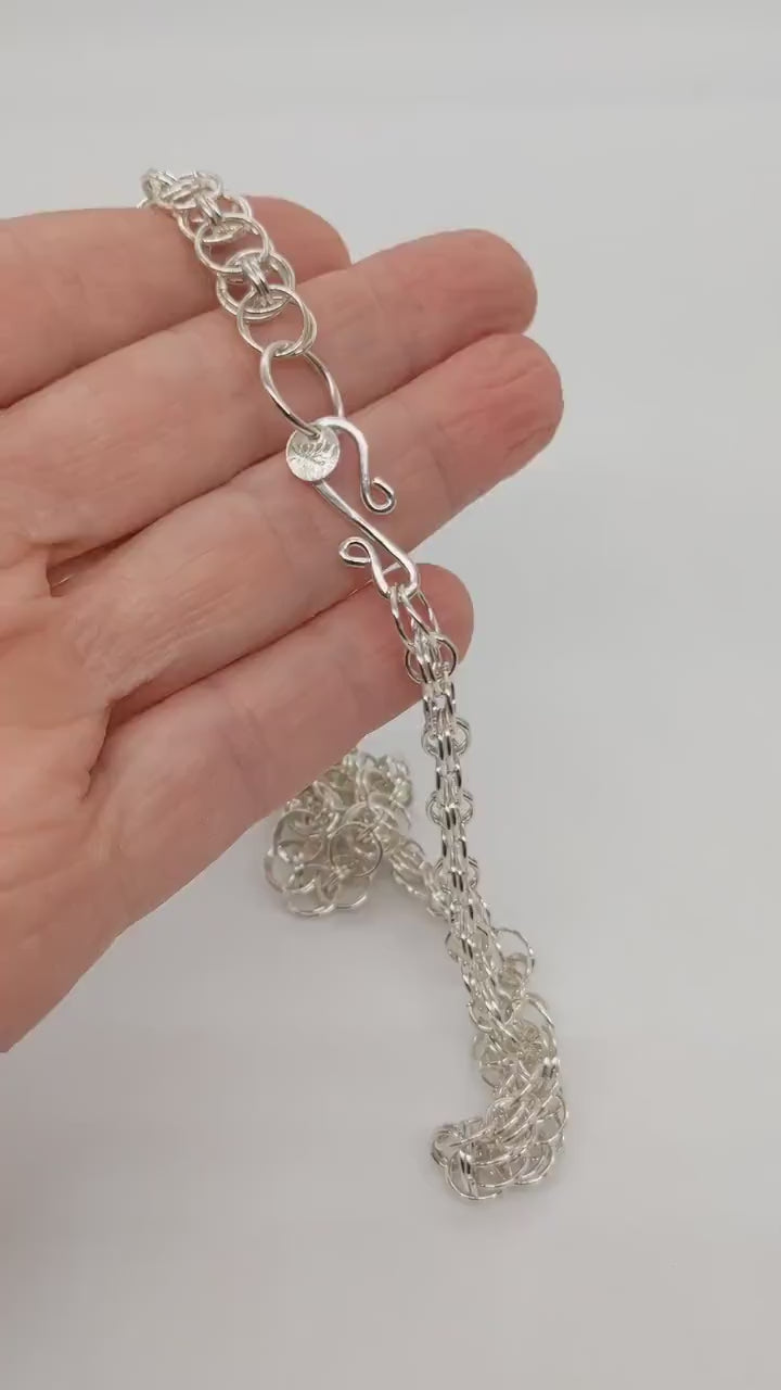 Video demo of helm chain necklace showing the design and clasp.