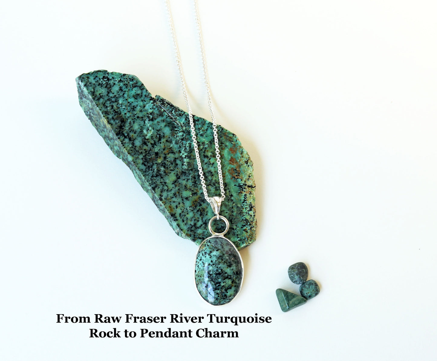 Turquoise pendant charm on a white background with text about Fraser River turquoise.