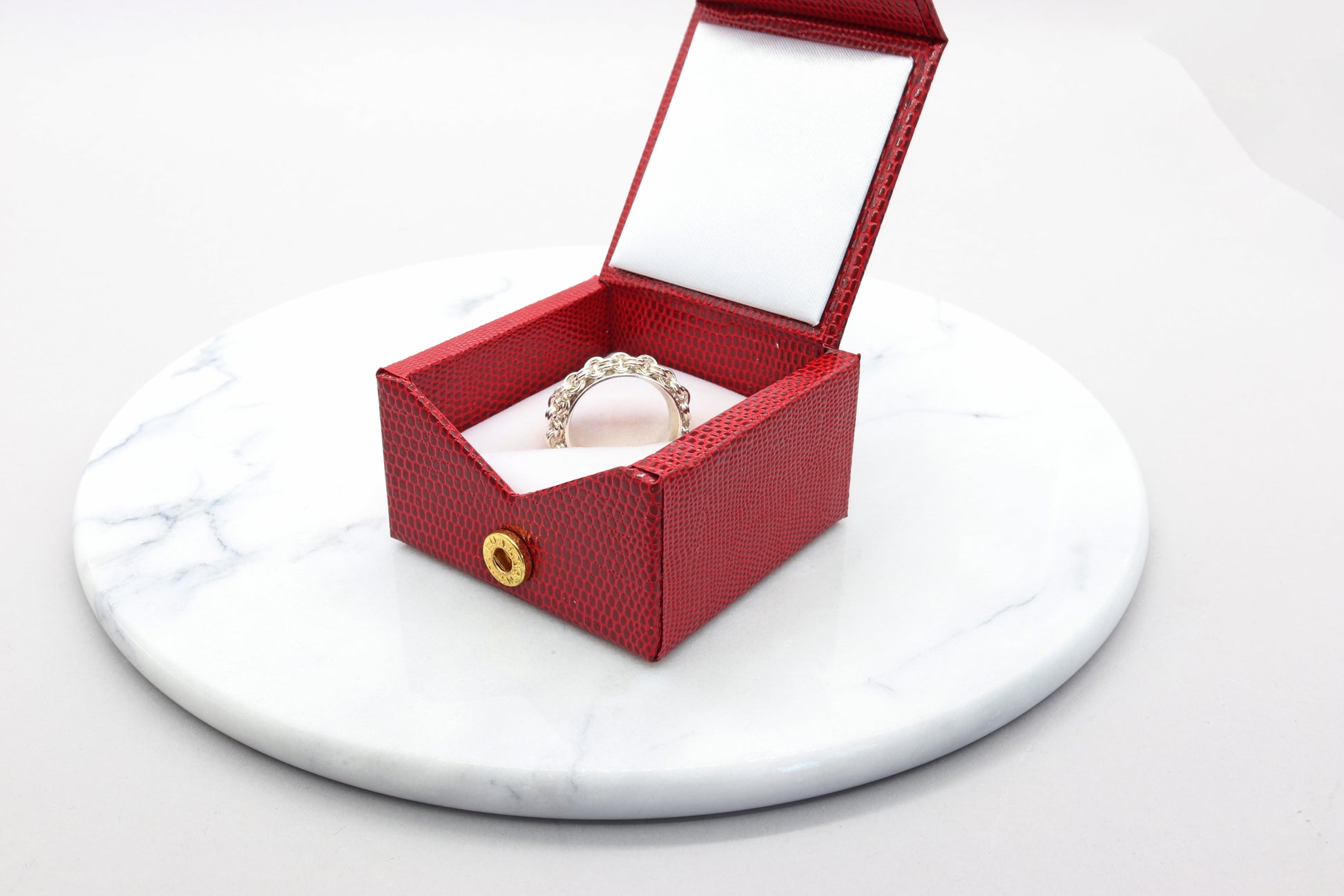 Ring packaged in a red stylish gift box