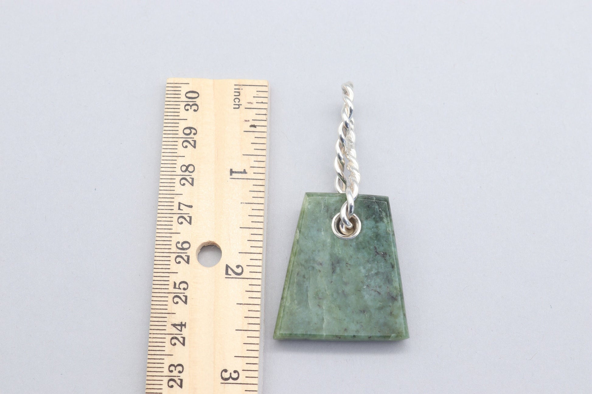 Handcrafted in our Missouri USA studio is this 2.5 inch reversible trapezoidal shaped Wyoming Jade pendant with a twisted sterling Argentium 935 bail.