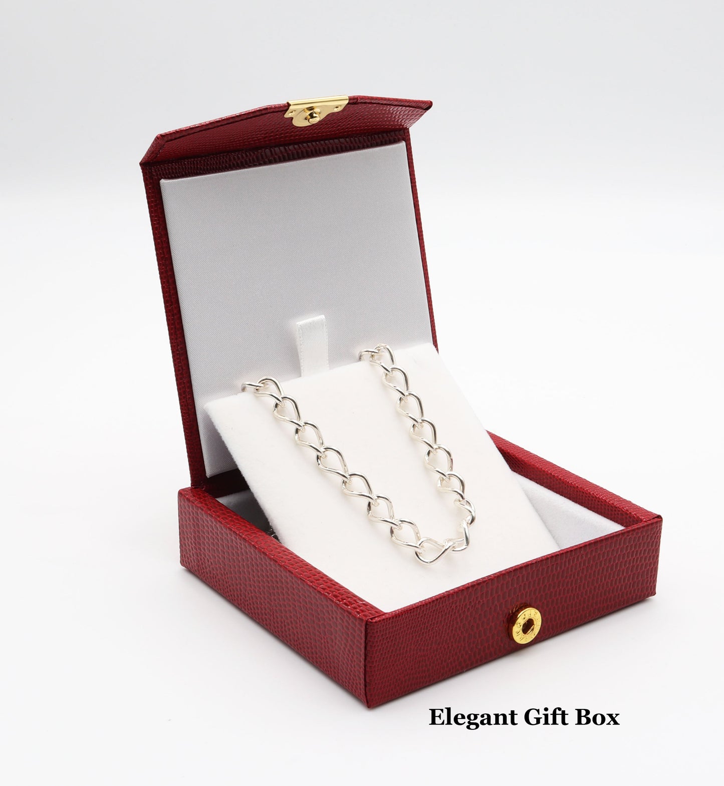 Oval Link Chain is Packaged in Red Faux Leather Gift box with white lining. Shown inside the gift box ready to gift.