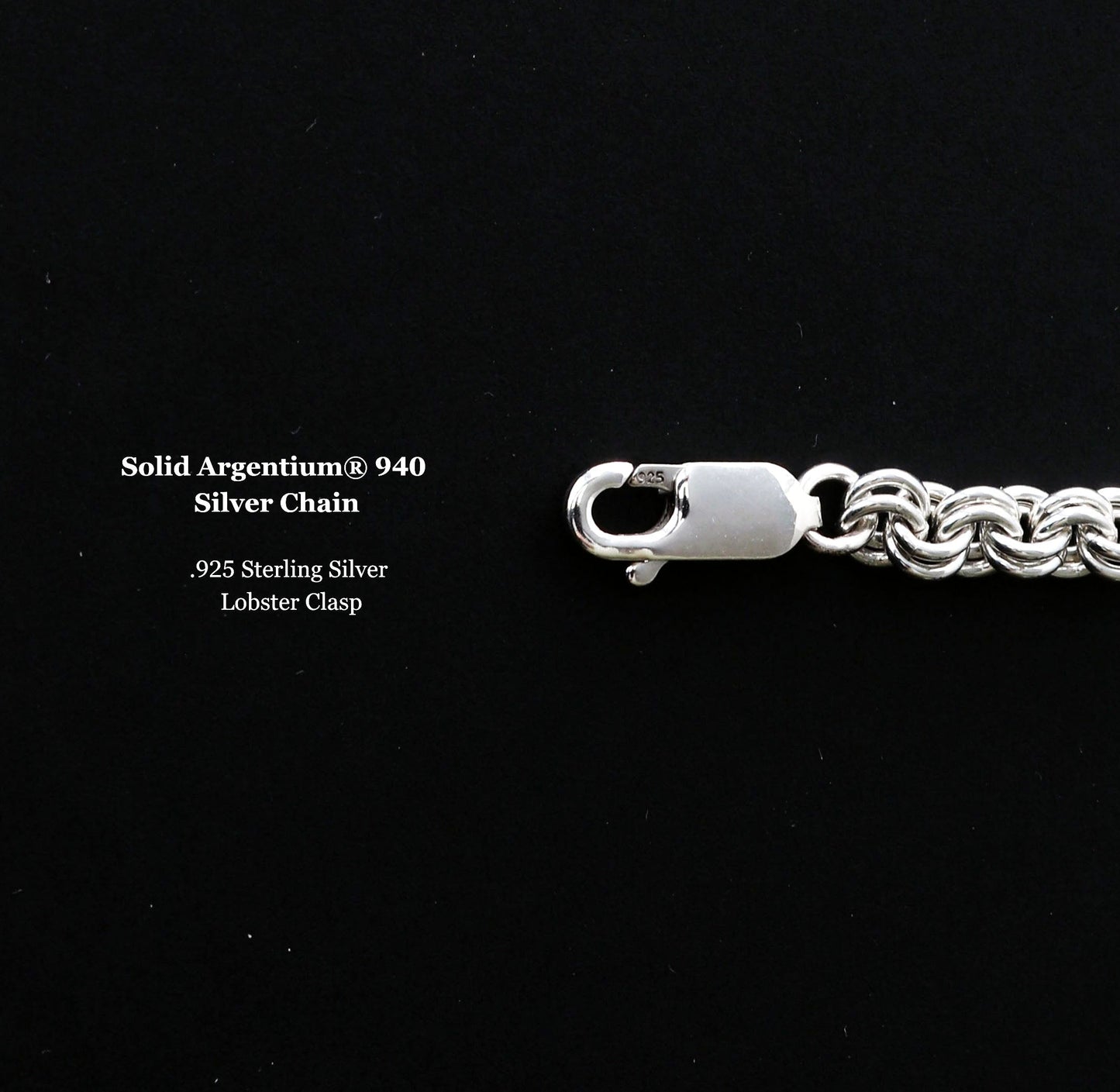 Silver chain with lobster clasp on a black background