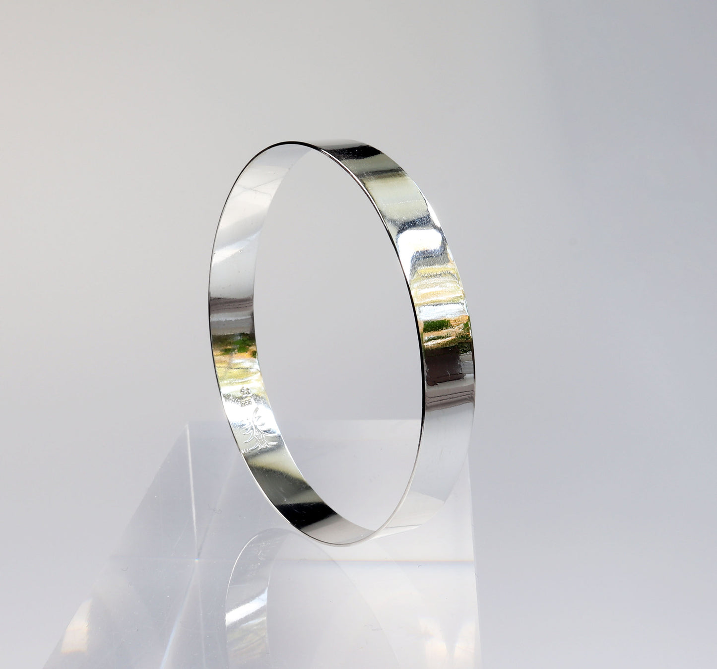 Argentium Bangle Bracelet shown against light gray background.
