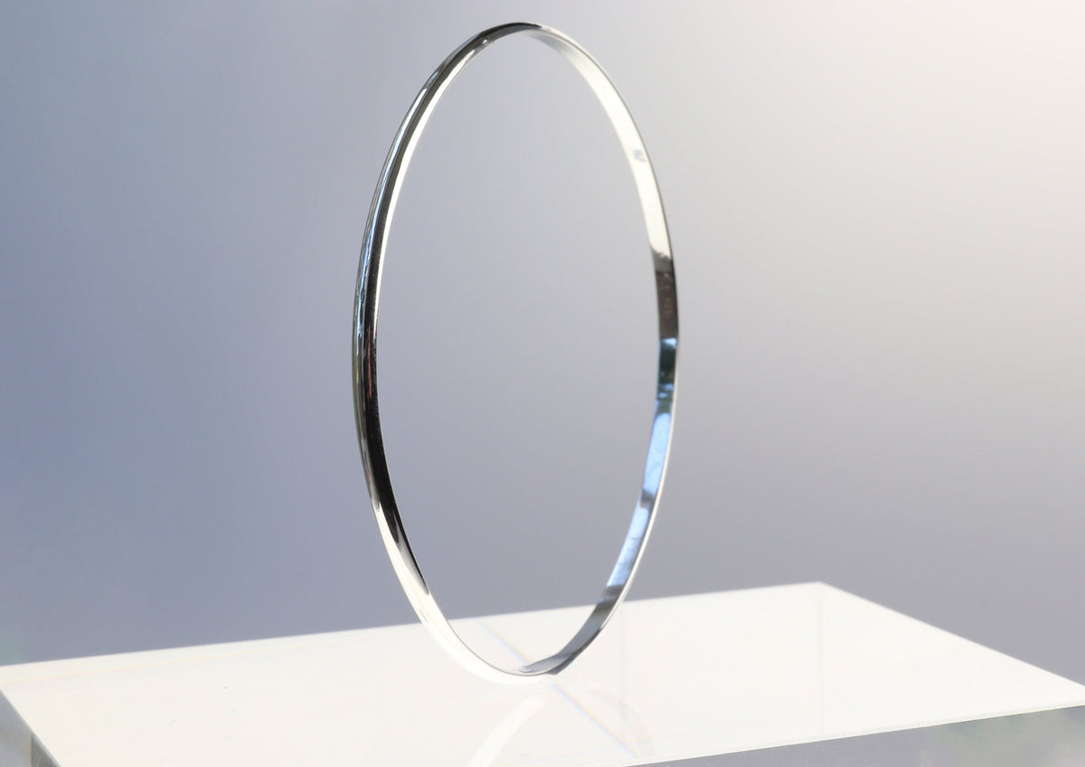 Polished solid Argentium 935 silver half-round bangle bracelet handcrafted in Missouri