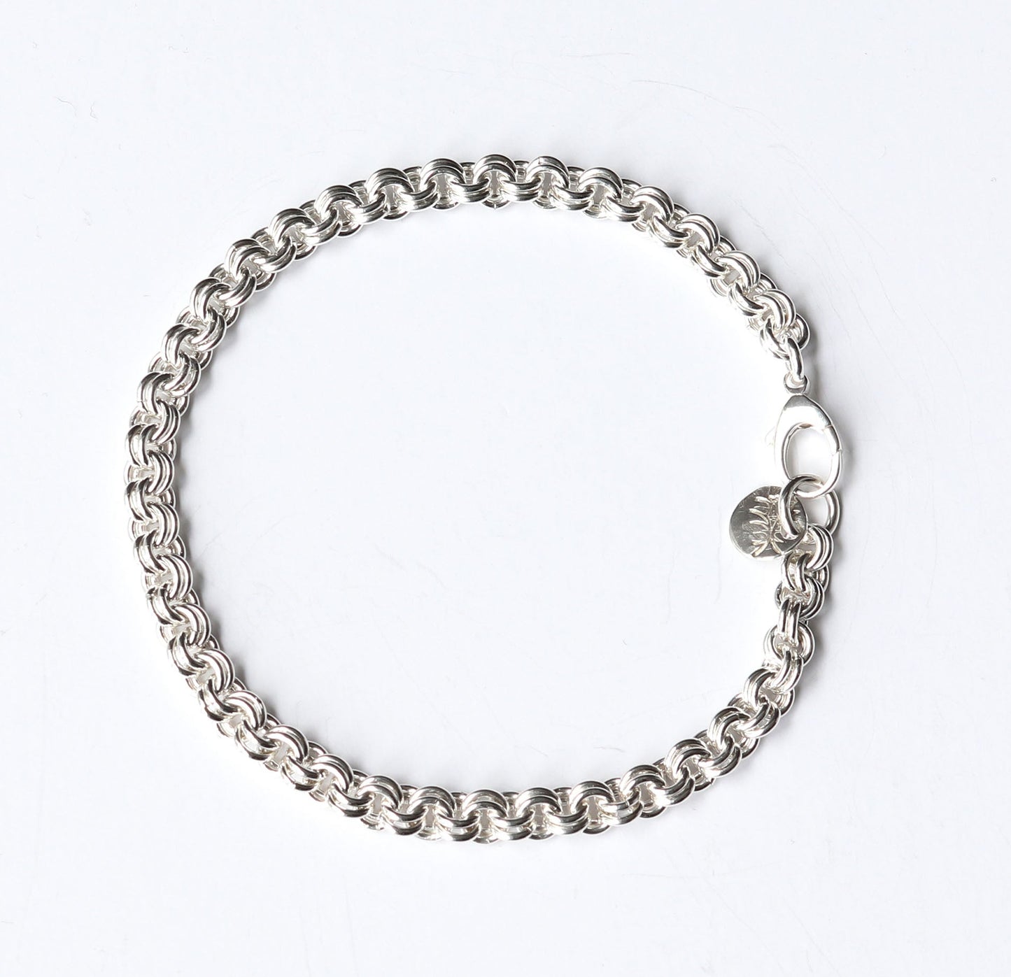 Argentium Silver chain bracelet on a white background