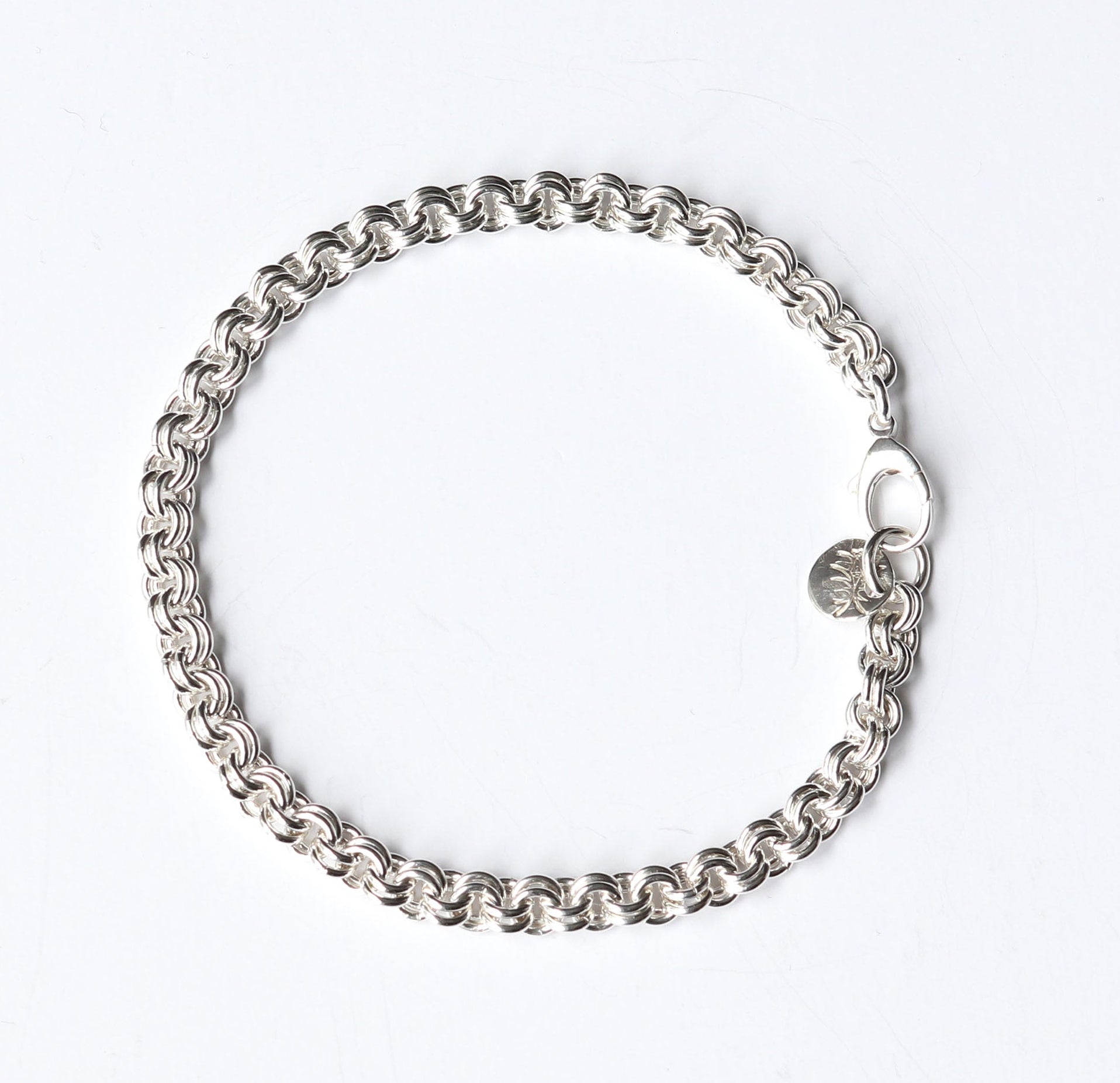 Argentium Silver chain bracelet on a white background