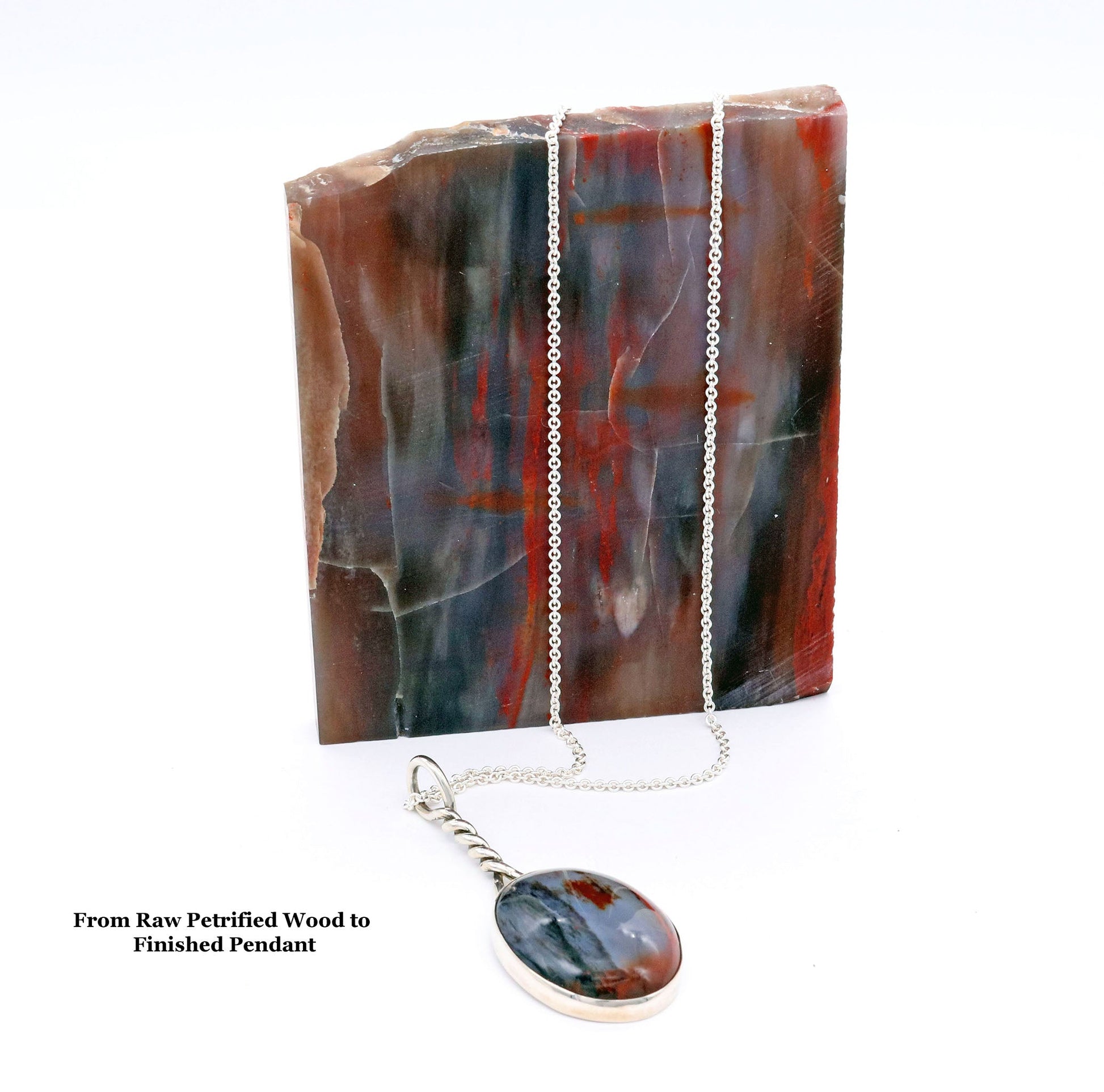 Raw Petrified Wood rock shown with pendant crafted from this rock.  Pendant is set in Argentium with Argentium custom bezel.  Pendant shown with Argentium chain draped over raw Petrified Wood rock against light gray background.  Text overlay reads From Raw Petrified Wood to Finished Pendant