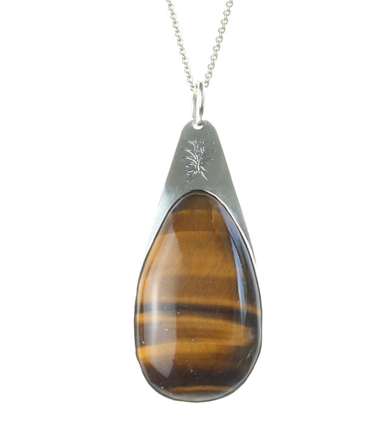 A handcrafted Tiger's Eye Pendant polished to bring out its unique silky wavy brilliance and natural chatoyancy. Set in a custom Argentium® .935 Silver bezel and paired with a 935 Argentium necklace chain on a white background.