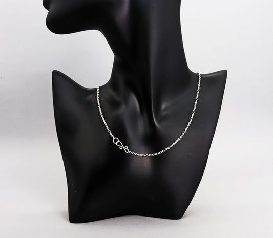 Introducing our handcrafted .935 Argentium® Silver Oval Chain Necklace, a stunning blend of style, durability, and comfort. This necklace features a bright white finish, tarnish resistance, and hypoallergenic properties, making it perfect for everyday wear or special occasions.