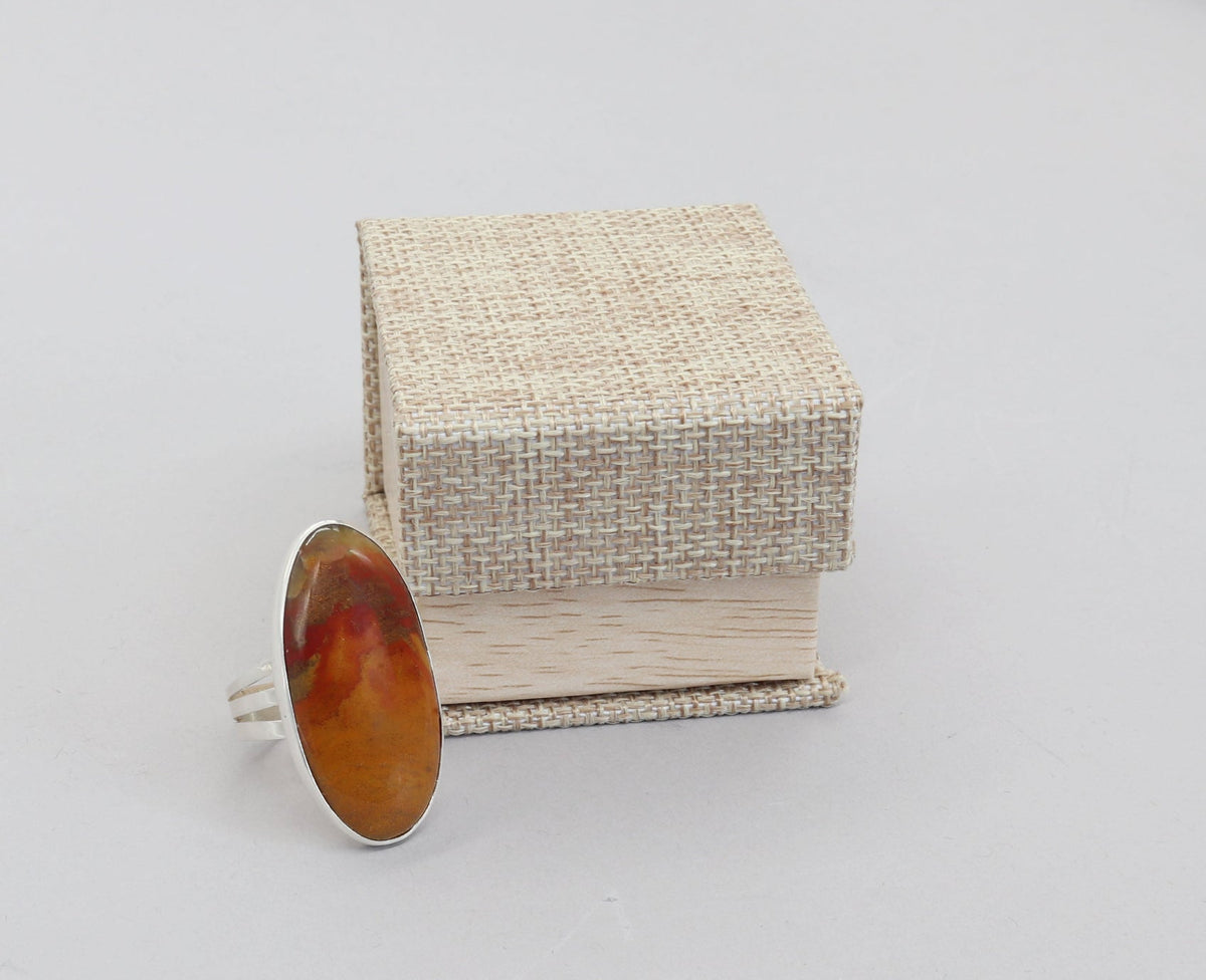  Natural Sonoran Sunrise gemstone ring in solid Argentium 935 silver, size 10.5 next to a gift box
