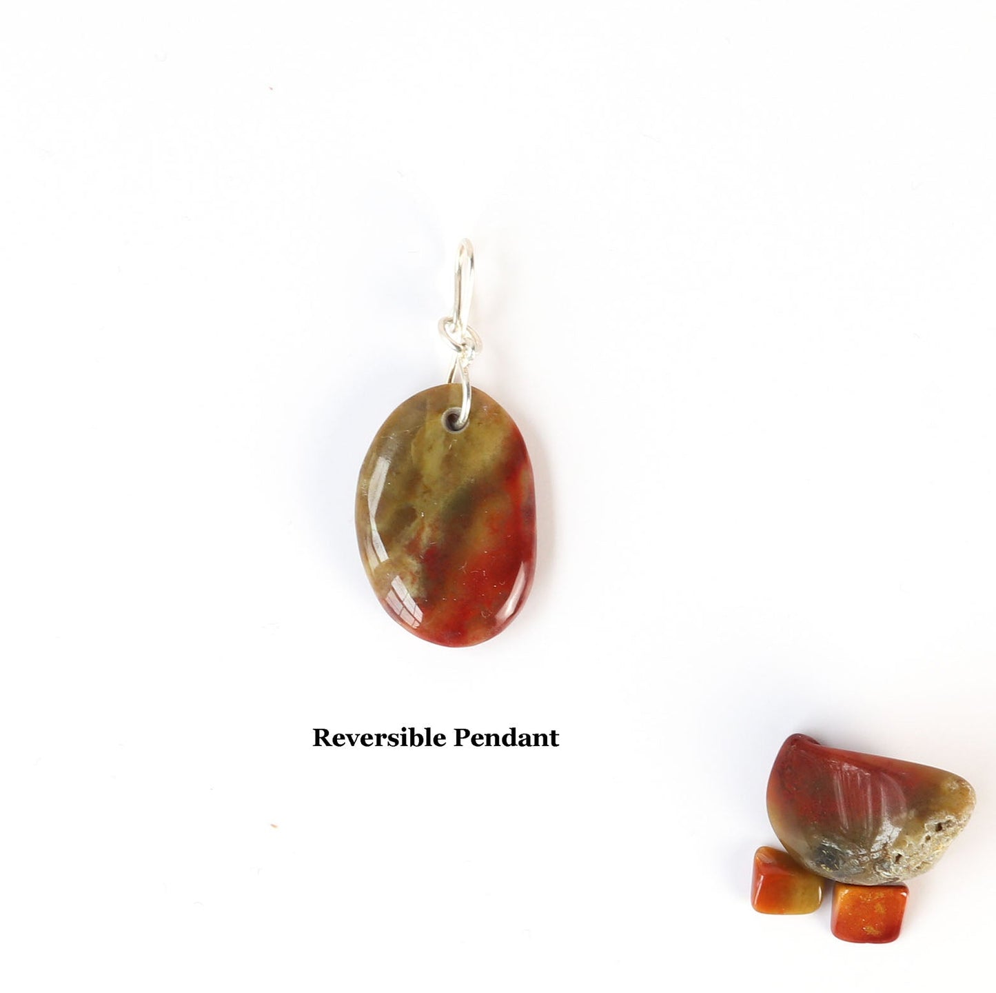 Sonoran Sunrise Reversible pendant with red and green natural pattern on a white background