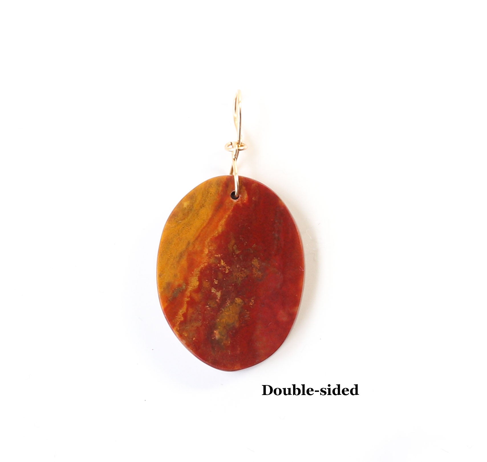 Double-sided  Sonoran Sunrise Pendant. Hand-cut and polished to reveal the vivid bands of deep red cuprite swirls along with golden ochre and sun-baked mustard tones with Finished with custom 14/20 Gold-Fill bail. Reverse side Shown on white background.