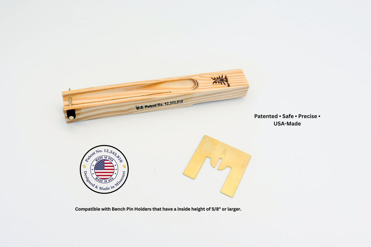 A wooden bench pin holder with a slotted interior and engraved logo with U.S. Patent No.12,343,810 , shown alongside a brass pin and a circular 'Made in the USA' seal on a white background, with descriptive text overlays.'Patented Safe Precise USA-Made'