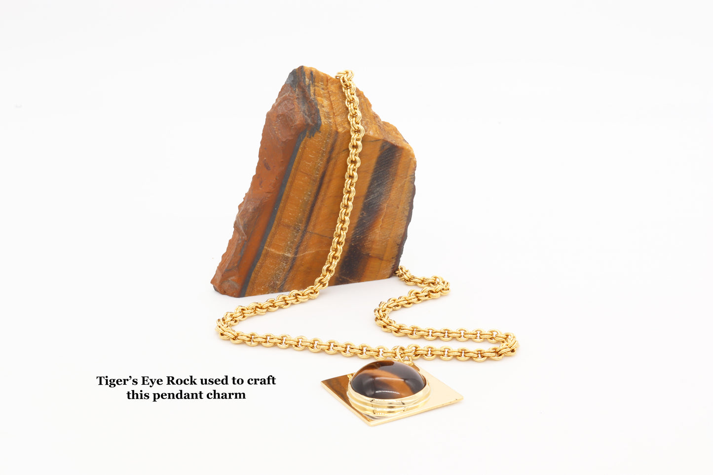 Tiger’s Eye rock used to craft pendant. This one-of-a-kind artisan pendant is hand-cut and polished in our Missouri studio, ensuring a high-quality, handcrafted component for your custom jewelry designs.   Shown with double cable brass chain sold separately.