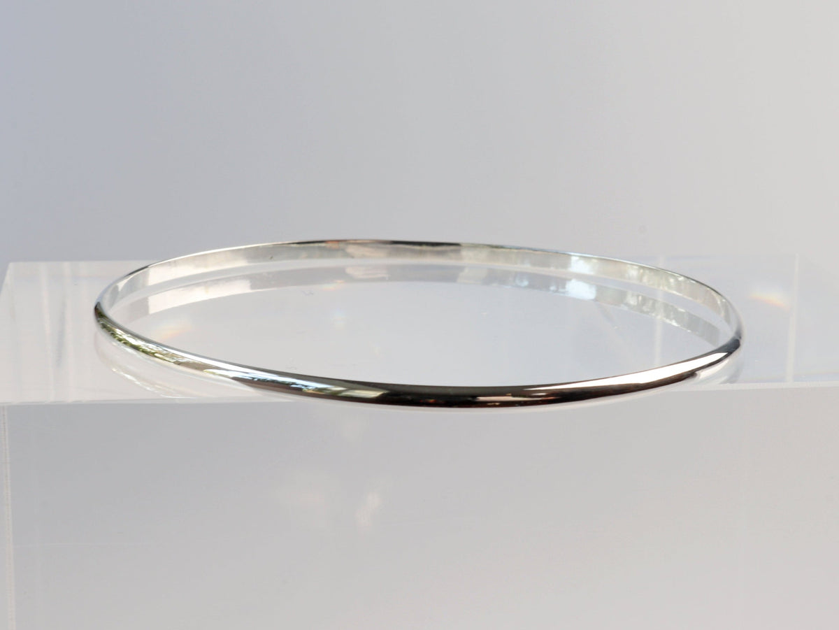 Polished solid Argentium 935 silver half-round bangle bracelet handcrafted in Missouri