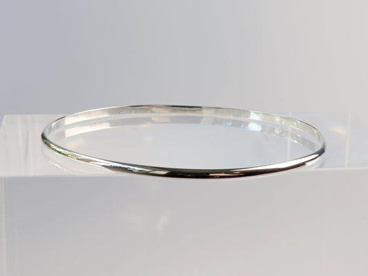 Polished solid Argentium 935 silver half-round bangle bracelet handcrafted in Missouri