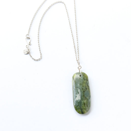 A silver chain necklace featuring a polished California nephrite stone pendant with natural marbled patterns, displayed on a clean white background.