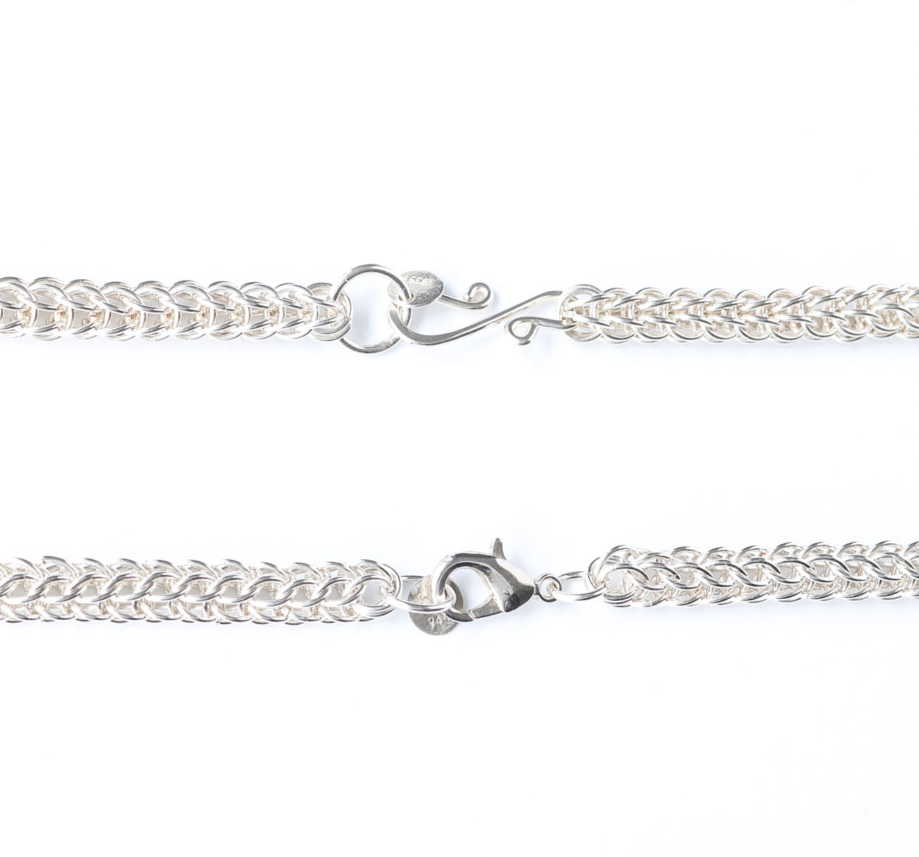 Closeup of custom S-Hook clasp and teardrop lobster options for Argentium Silver 6 and 1 persian weave chainmail chain on a white background