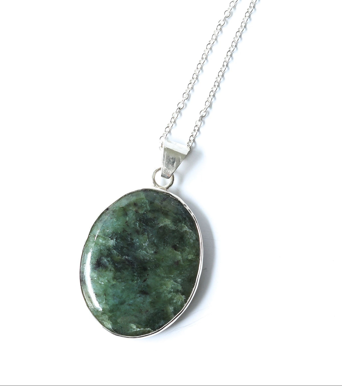 Hand-cut Wyoming nephrite jade oval pendant with Argentium Silver bail and chain, shown against a plain white background.