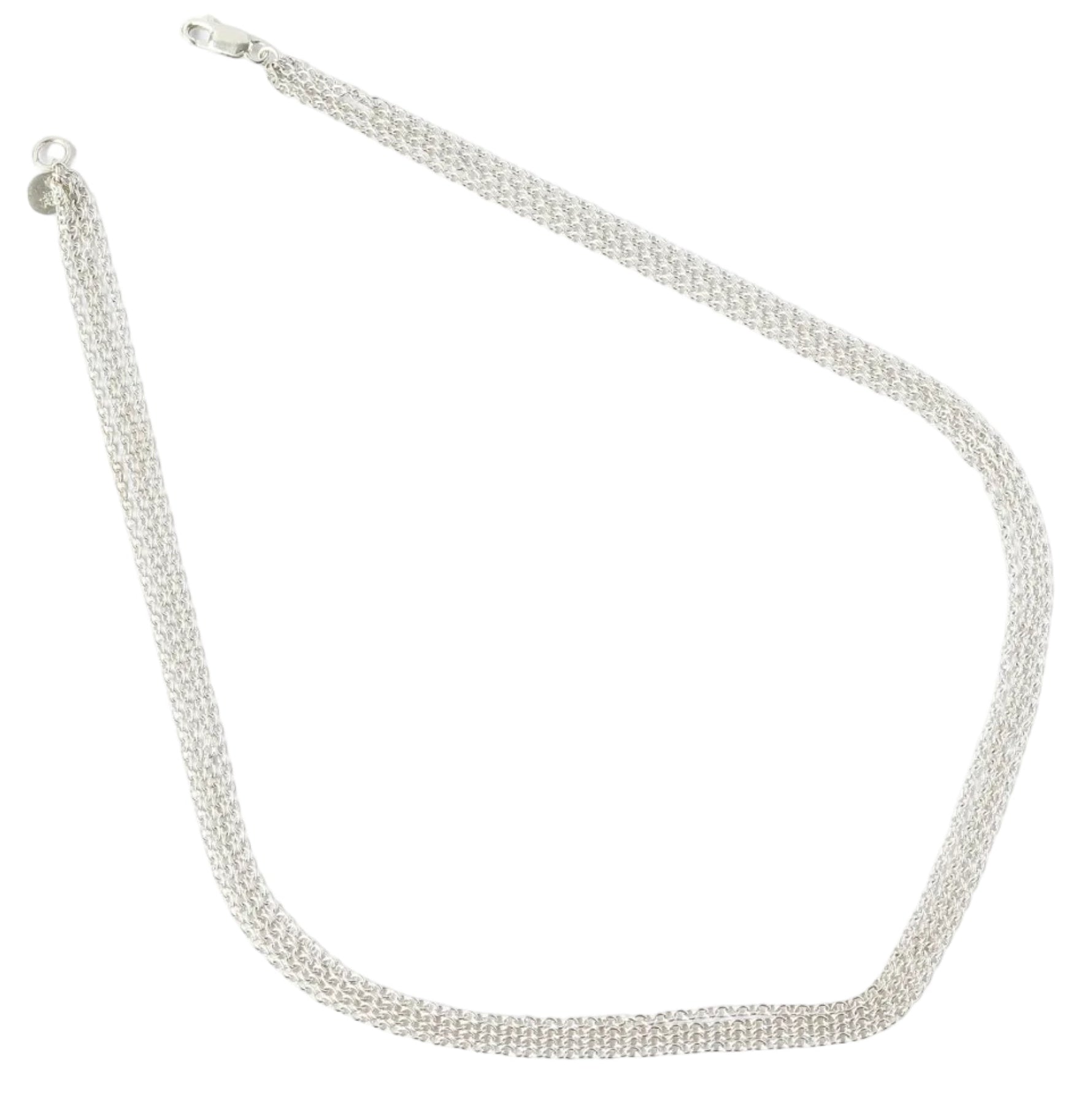 Silver chain necklace on a white background