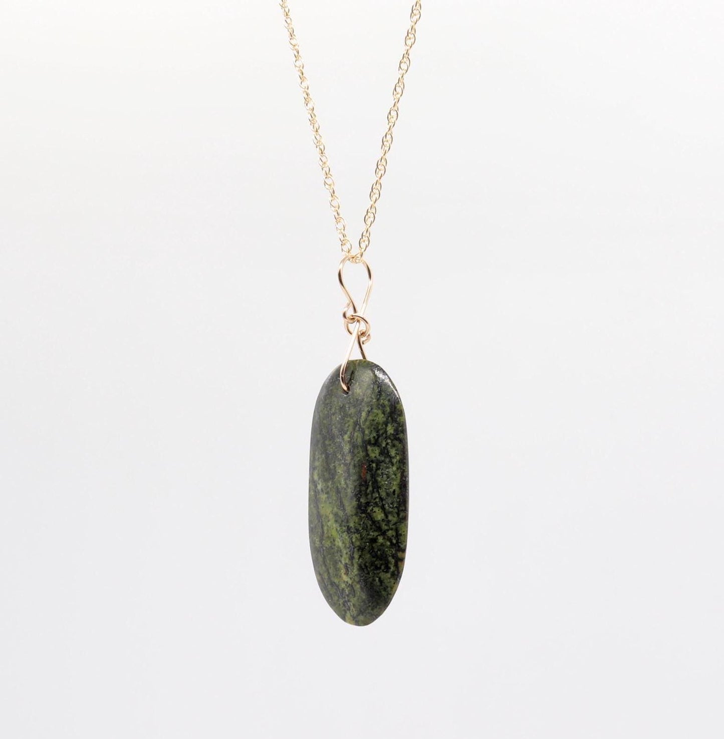 Forest Green Jasper Pendant – Jewelry Focal Piece shown suspended from a gold-filled wire figure-8 shaped bail attached to a gold-filled rope chain.