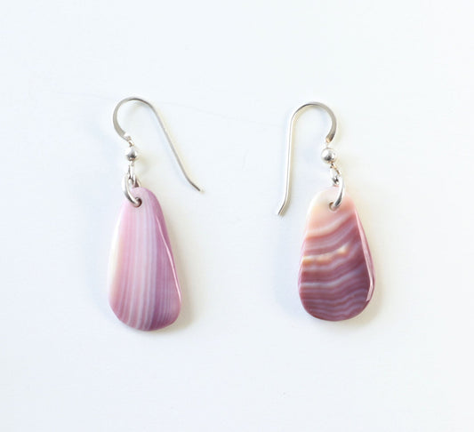 One-of-a-kind shell earrings handcrafted in our Missouri studio using natural Quahog shells—known for soft lavender and cream tones. 