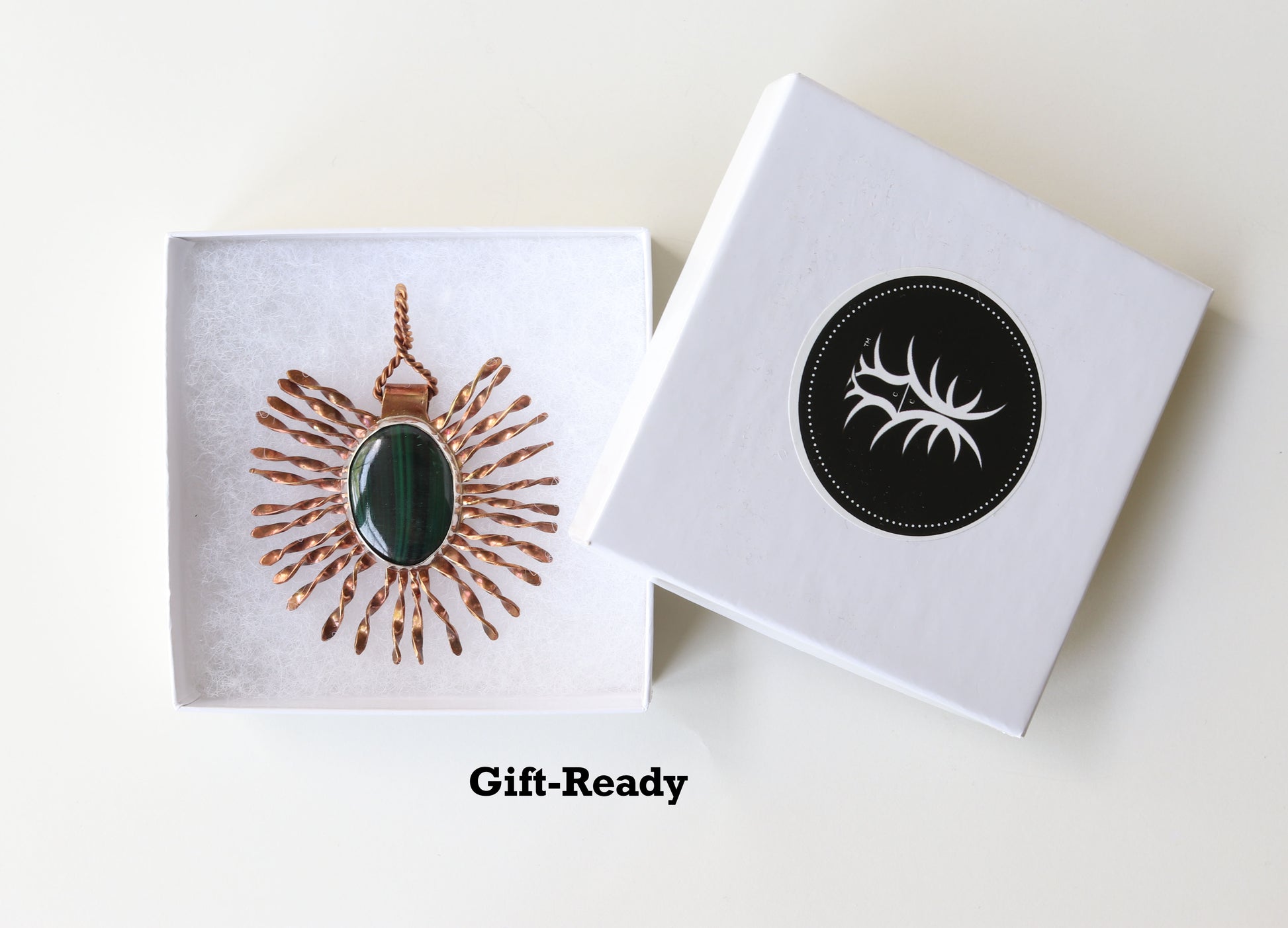 Pendant shown in signature gift box and comes gift ready.