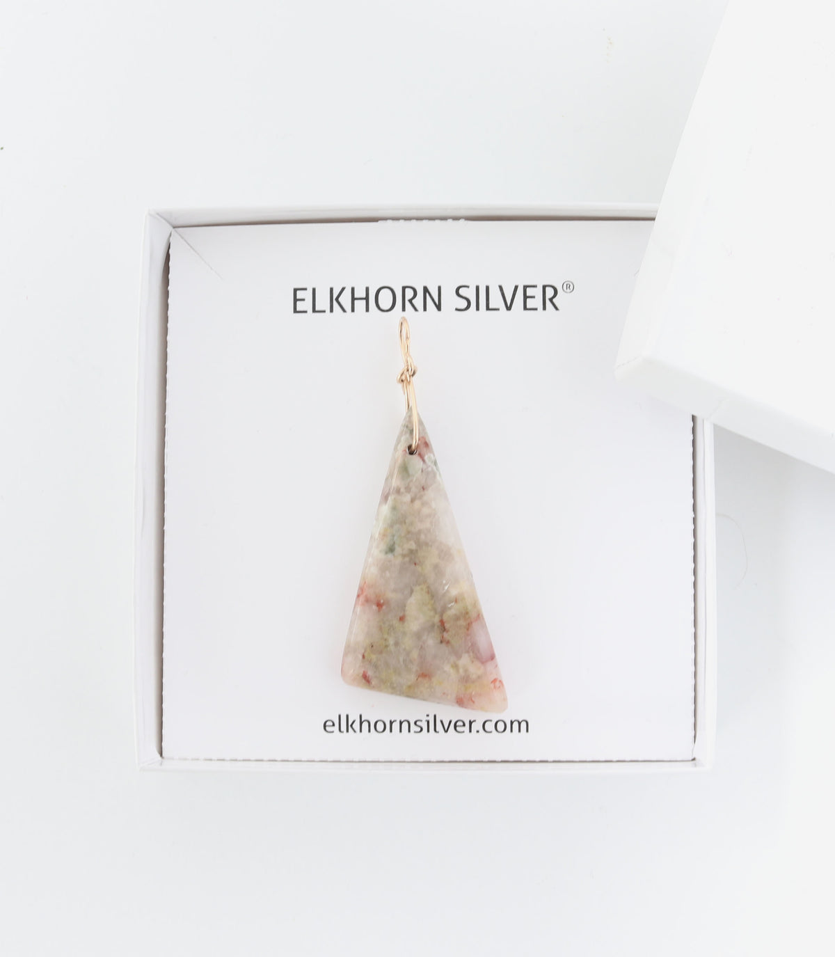 Elkhorn Silver sunstone pendant shown on gift box with a white background