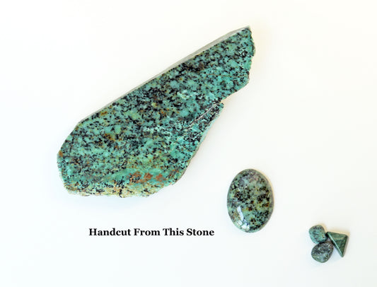 Fraser River Turquoise cabochon shown beside the original rough stone it was hand-cut from, highlighting natural blue-green hues and black matrix.