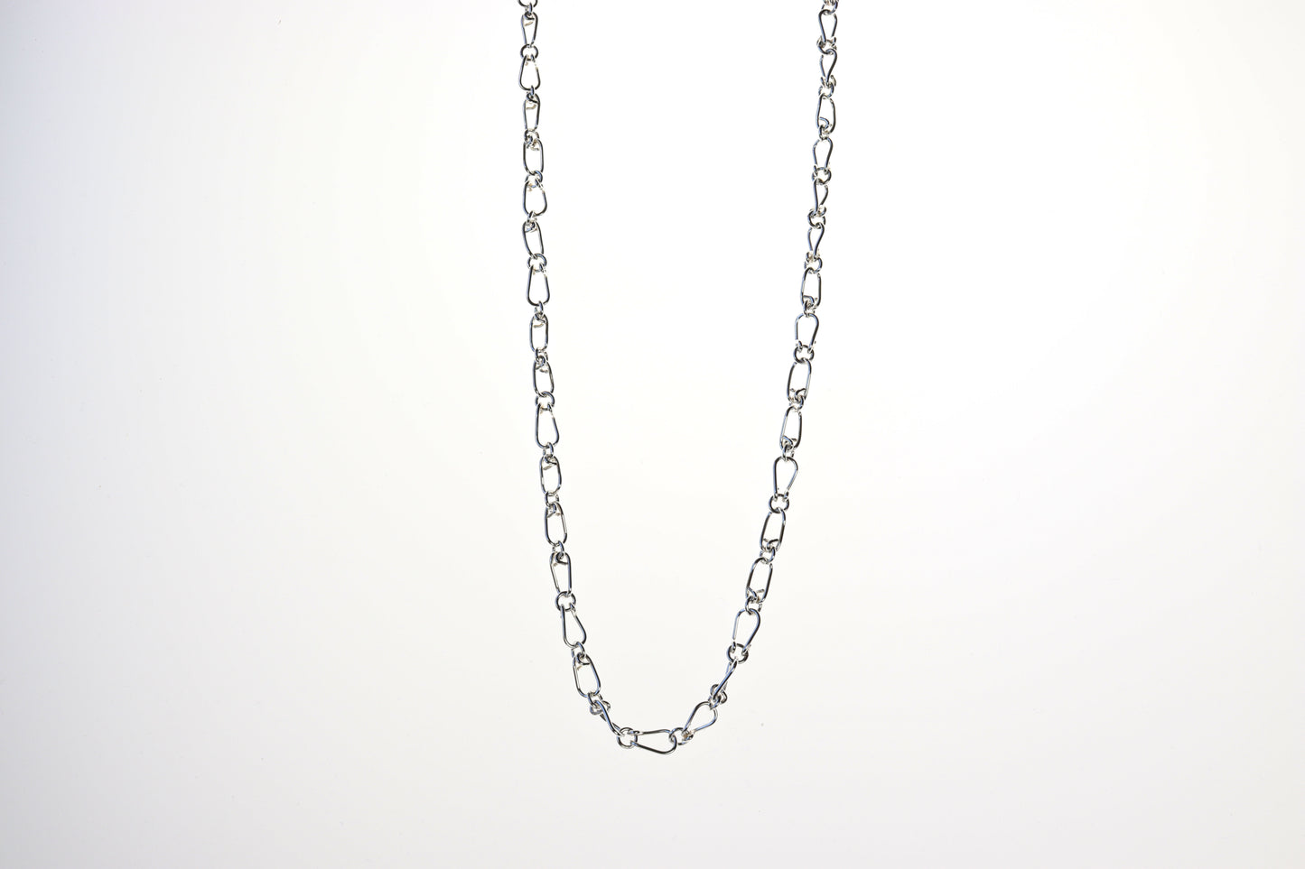 Discover the timeless beauty of our Silver Teardrop Chain Necklace, meticulously handcrafted in our Missouri studio using premium .940 Argentium sterling silver. This delicate yet durable chain features uniquely designed teardrop-shaped links, each crafted from 20-gauge wire for a refined and sophisticated look.