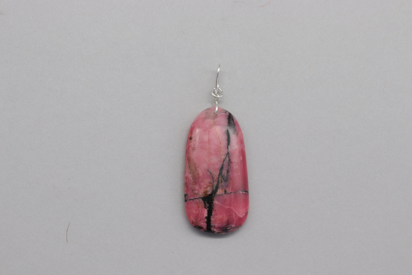 Rhodonite Crystal Pendant, Handcut and Polished in USA with infinity bow silver bail, USA made