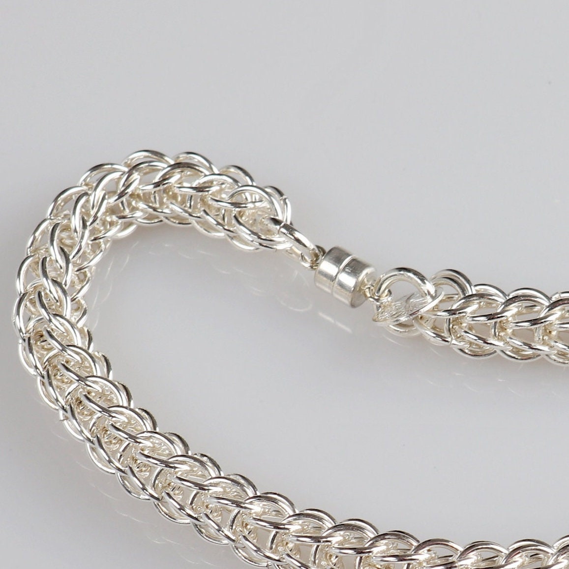 A 935 sterling Argentium Silver Full Persian Weave bracelet, crafted in our Missouri studio. This eye-catching versatile full Persian weave bracelet features a magnetic clasp that holds securely, yet opens and closes easily. Argentium 935 is known for its tarnish resistant hypoallergenic qualities and contains more pure silver than the typical .925 Sterling silver. 